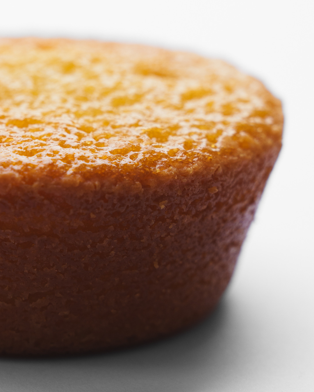 Pixlcat butter mochi with golden caramelized top and dense chewy center, naturally gluten-free Hawaiian dessert baked with mochiko rice flour